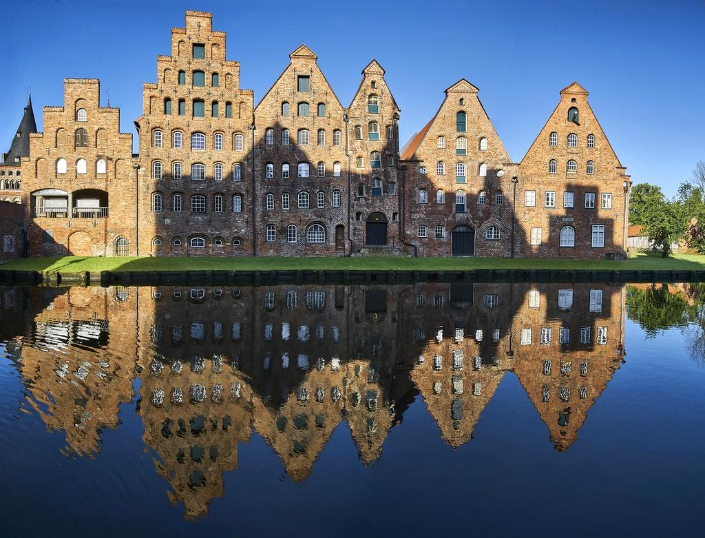 Modern modular entryway storage system with hidden compartments and shoe organization
